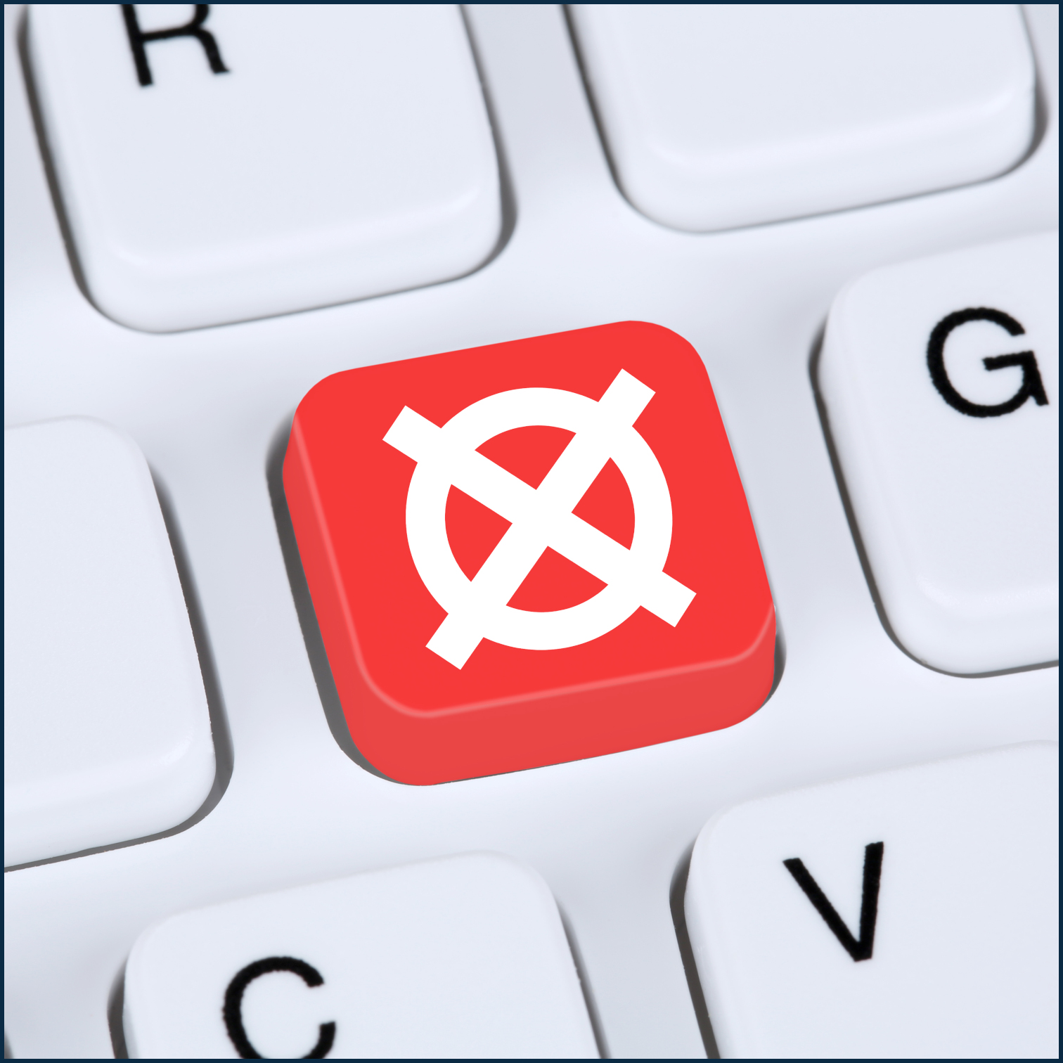 A small section of a keyboard with a custom red x in a red circle key