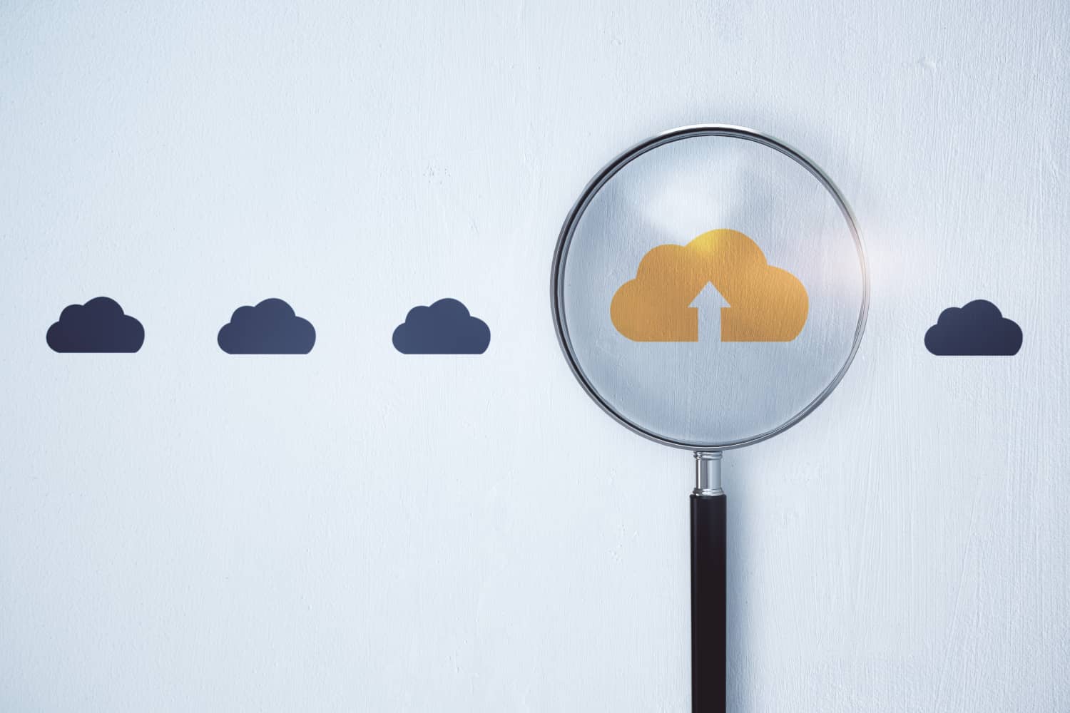 Several blue clouds in a line with one orange cloud in the middle under a magnifying glass